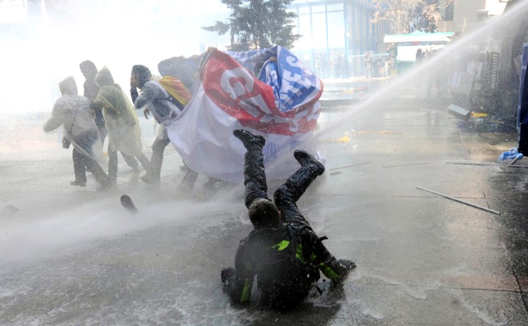 Police use water cannon to disperse demonstrators during a protest against a government attempt to railroad a new education bill through parliament in Ankara, Turkey on March 29.