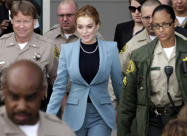 Actress Lindsay Lohan departs the hearing in her DUI case at Airport Branch Courthouse in Los Angeles, Calif. on March 29.