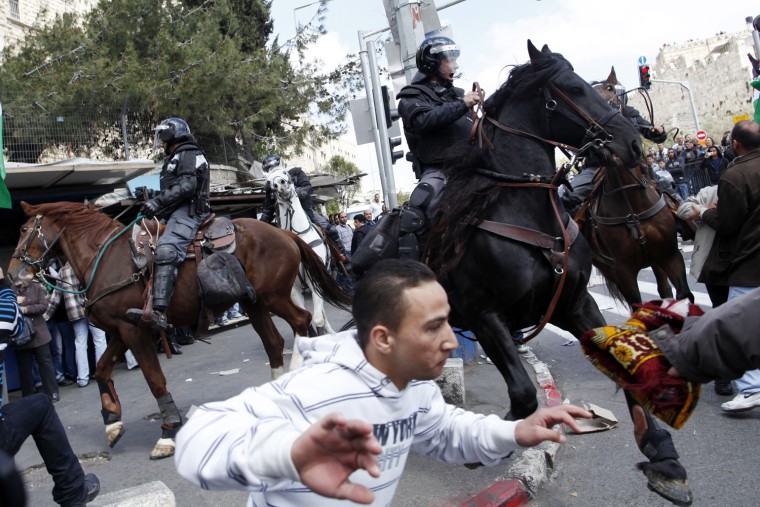 Israeli mounted policemen move crowds of Palestinian protestors during a demonstration marking Land Day in the east of the city on March 30, outside the old city of Jerusalem, Israel. Land Day, which began in 1976, marks the day Israeli forces killed six Palestinians during a protest against Israeli occupation of what Palestinians consider to be their land. Palestinians around the world will commemorate Land Day with protests and demonstrations.