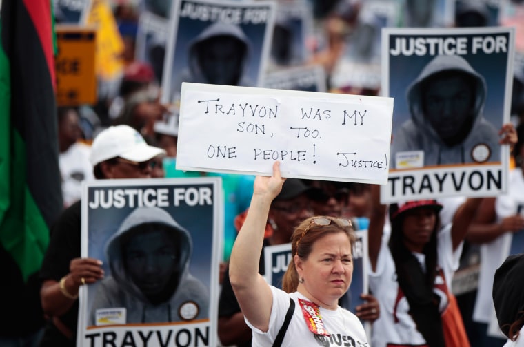 Demonstrators march during an NAACP march and rally for Trayvon Martin in Sanford, Fla., March 31.
