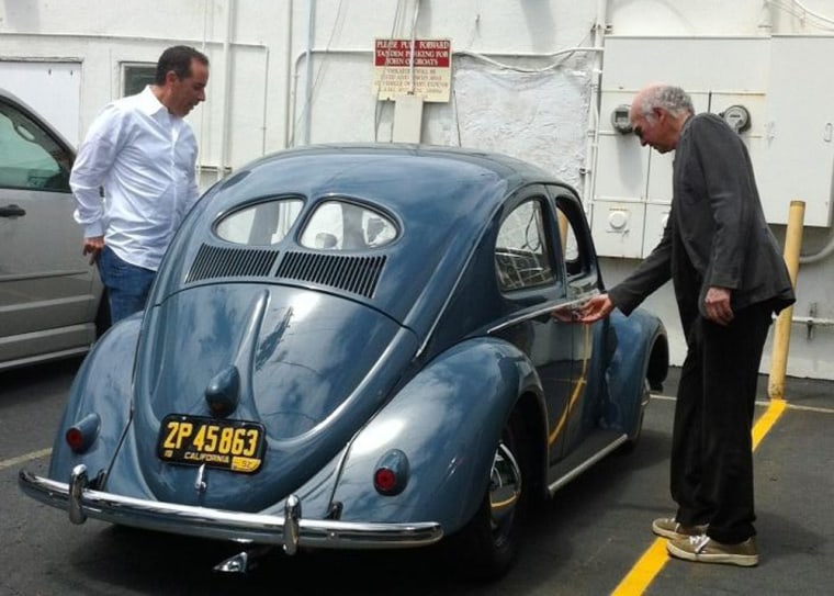 Jerry Seinfeld, left, and Larry David with a 1952 VW Bug.