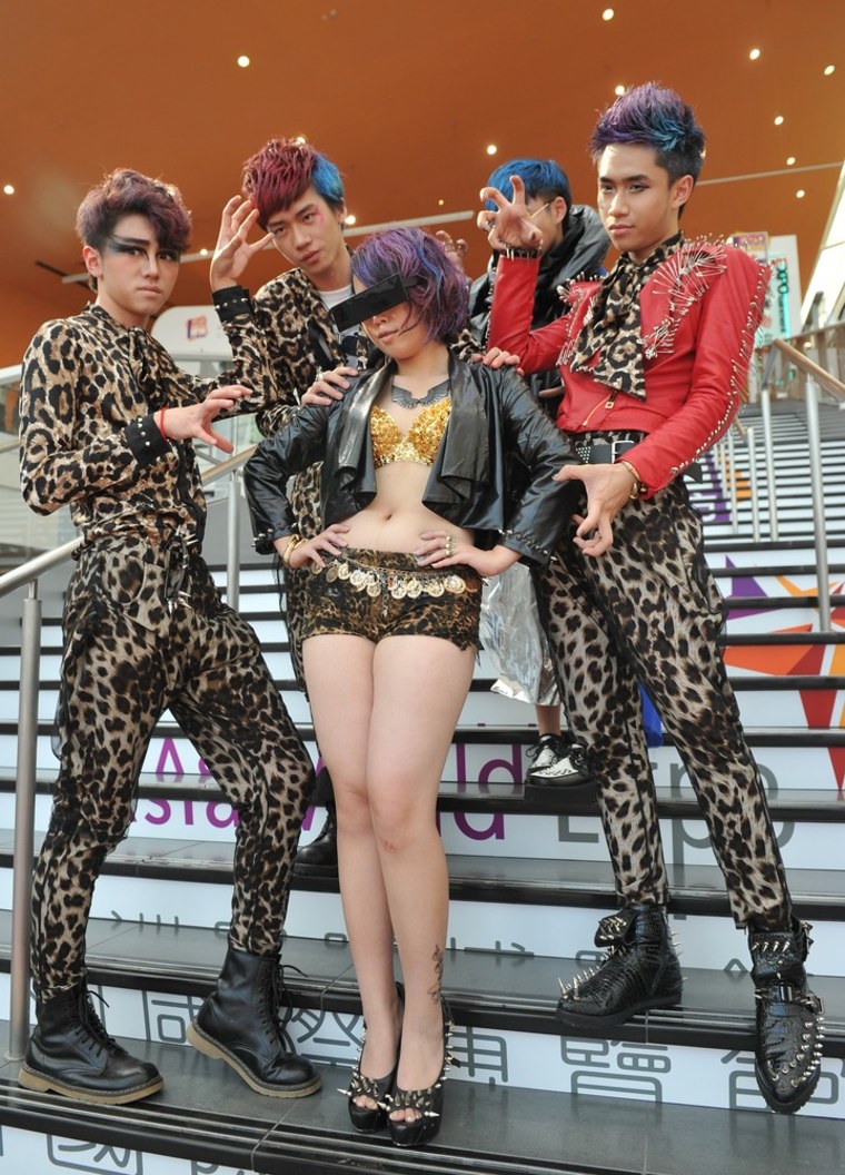 Fans of US pop diva Lady Gaga strike a pose before her concert in Hong Kong on May 2. The eccentric star, who has a record number of almost 22 million followers on Twitter, kicked off her world tour in Seoul on April 27 and will play three concerts in Hong Kong followed by Japan, Singapore, New Zealand and Australia.