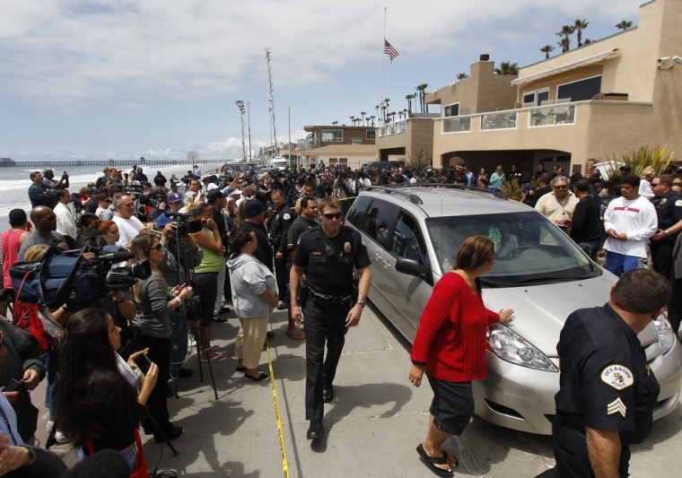 A van with family members of former NFL football star Junior Seau leave his home in Oceanside, Calif., Wednesday, May 2.