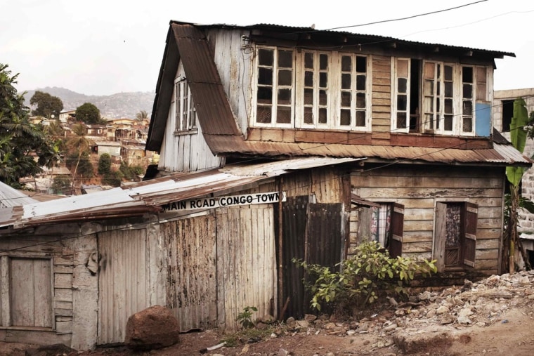 A traditional colonial-era Board House dating back about a century stands on the main road through the Congo Town neighbourhood of Sierra Leone's capital Freetown.
