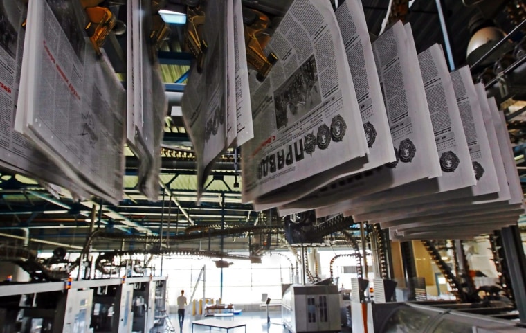 Pre-anniversary issues of paper 'Pravda' (Truth) are pictured while on the production line at the printing works outside Moscow.