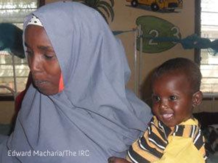 Assiyah Dagane Osman holds her son, Minhaj Gedi Farah, about two months after he was admitted to the IRC stabilization center in Hagadera camp, Dadaab, Kenya.
