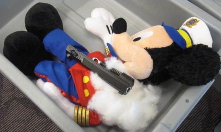 This photo provided by the Transportation Security Administration shows pistol parts hidden in a stuffed animal found at T.F. Green Airport in Warwick, R.I.