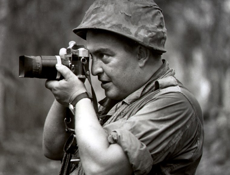 In this 1967 file photo Associated Press photographer Horst Faas works in Vietnam.