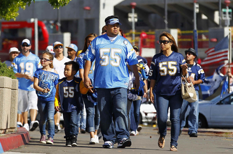 Fans arrive at Qualcomm Stadium to participate in a