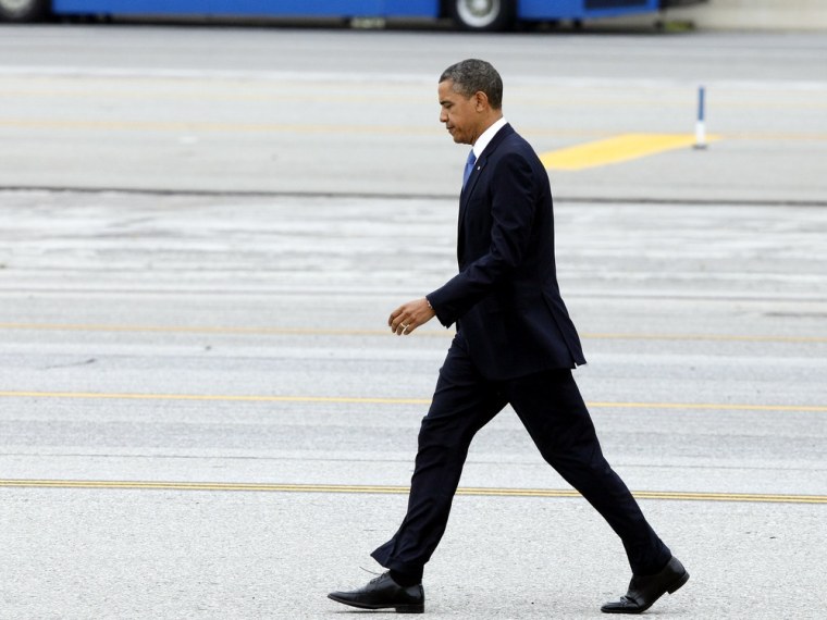 President Barack Obama arrives at JFK International Airport May 14 in New York on his way to deliver the commencement address at Barnard College in New York City.