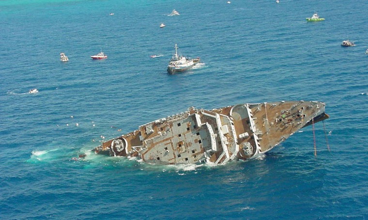 The Spiegel Grove rolls over after it sunk prematurely in the Florida Keys National Marine Sanctuary May 17, 2002.