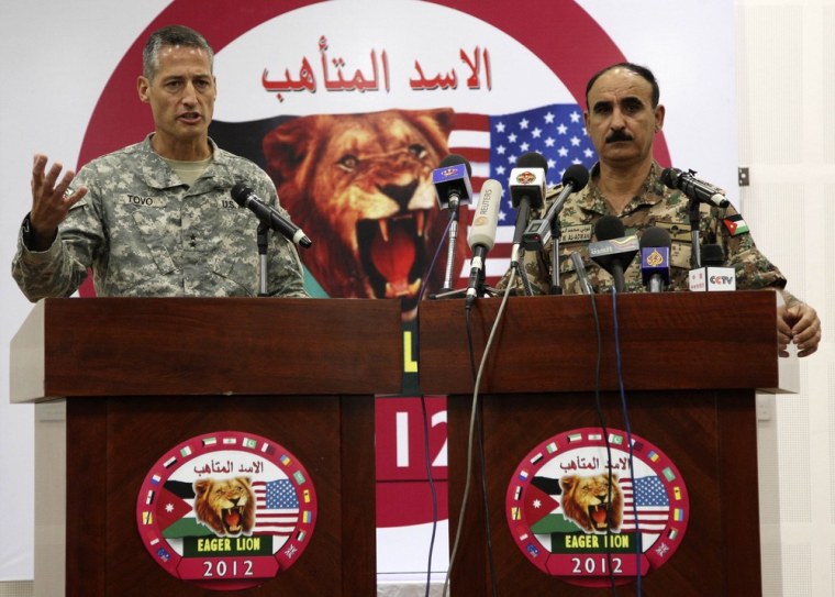 U.S. Major General Ken Tovo (left), commanding general of the Special Operations Command Central, and Major General Awni El-Edwan, chief of staff of Jordanian Army's operations and training, address a joint news conference in Jordan on Tuesday.