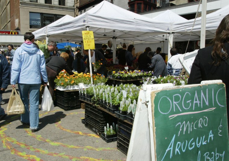 Vendors offer organically grown produce at the Union Square farmers market in New York City.