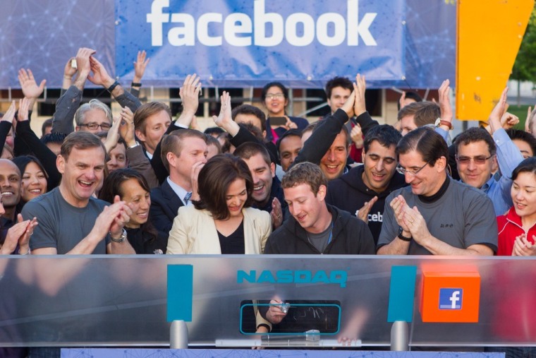Facebook founder and CEO Mark Zuckerberg rings the Nasdaq opening bell Friday from company headquarters in Menlo Park, Calif.