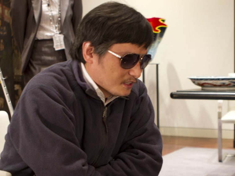 In this photo released by the US Embassy Beijing Press Office, blind lawyer Chen Guangcheng sits in a chair at the U.S. embassy before he left for a hospital in Beijing, May 2.