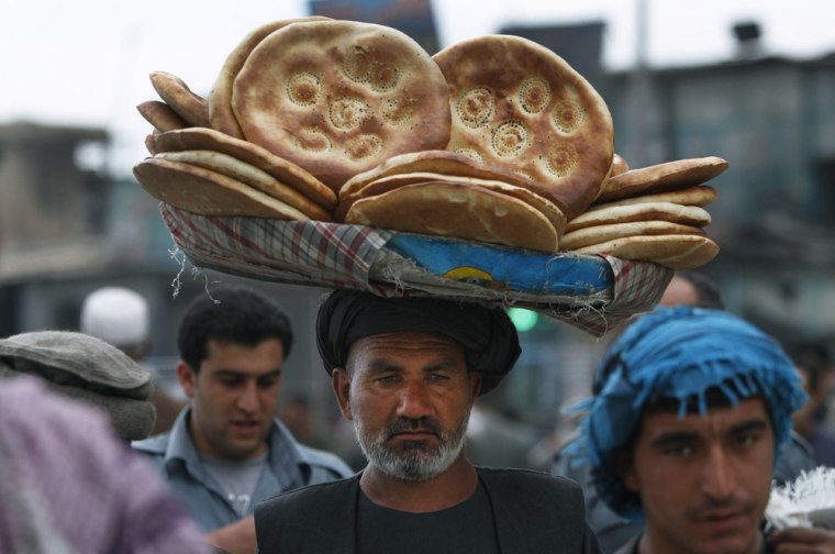 A street vendor carries bread in the Afghan capital Kabul on Saturday.