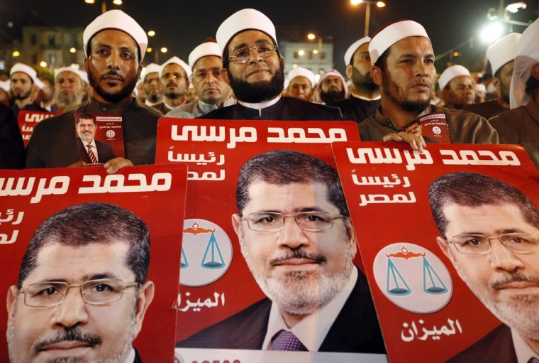 Several hundred imams listen to Mohammed Mursi at a rally in Cairo on May 20, 2012. The May 23-24 presidential election is the first since last year's ouster of longtime authoritarian ruler Hosni Mubarak.