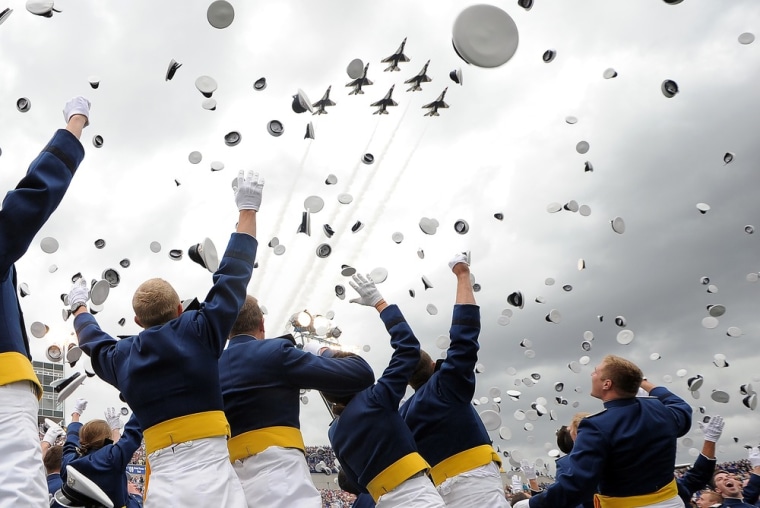 Air Force cadets celebrate during their graduation ceremony at the U.S. Air Force Academy in Colorado Springs, Colo. on May 23.