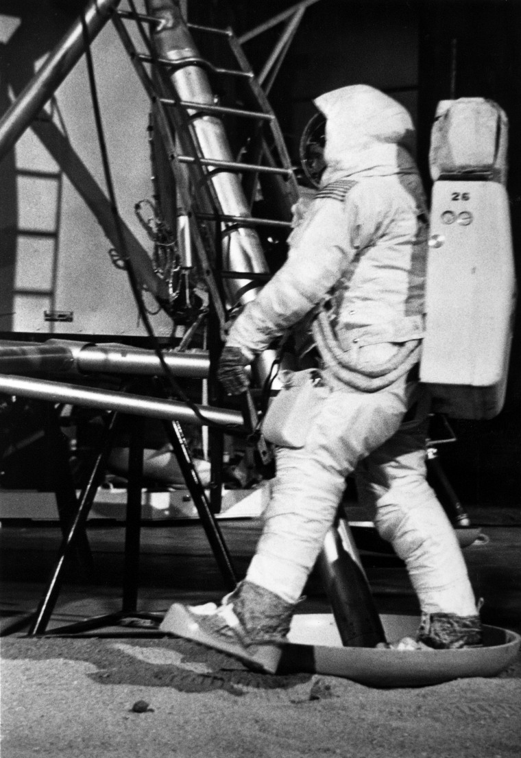 Neil Armstrong practices his "one small step" onto the surface of the moon at the Manned Spacecraft Center in Houston on April 22, 1969..