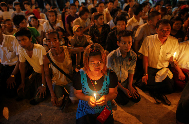 People pray during a protest against the shortage of electricity, at the Sule Pagoda in central Yangon, Myanmar on May 24. People staged another peaceful protest at the heart of the commercial city of Yangon against power blackouts across the country.