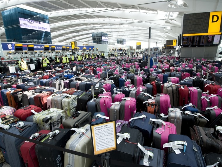 In this photograph released by British Airports Authority, over 2,400 pieces of baggage are seen lined-up in Terminal 5 at London's Heathrow Airport on May 23, 2012.