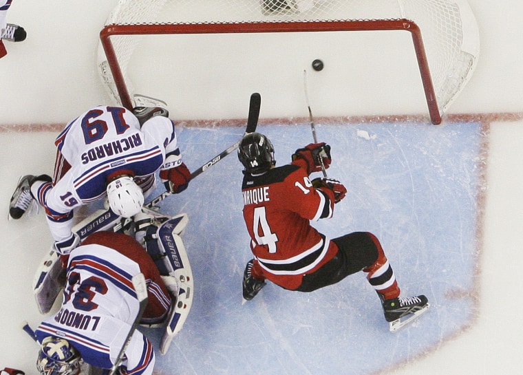 New Jersey Devils' Adam Henrique scores in overtime of Game 6.