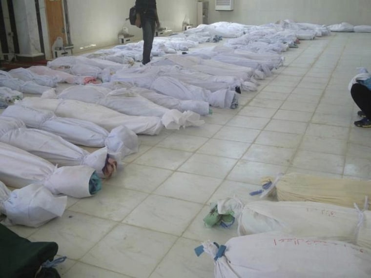 These were among the bodies being prepared for burial in Houla, Syria, on Saturday.