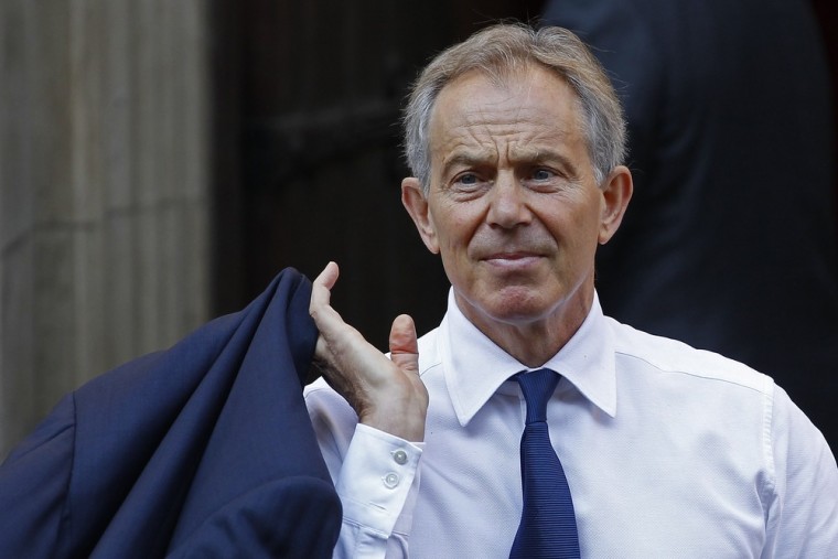 Heckler calls Tony Blair 'a war criminal' as former British PM appears