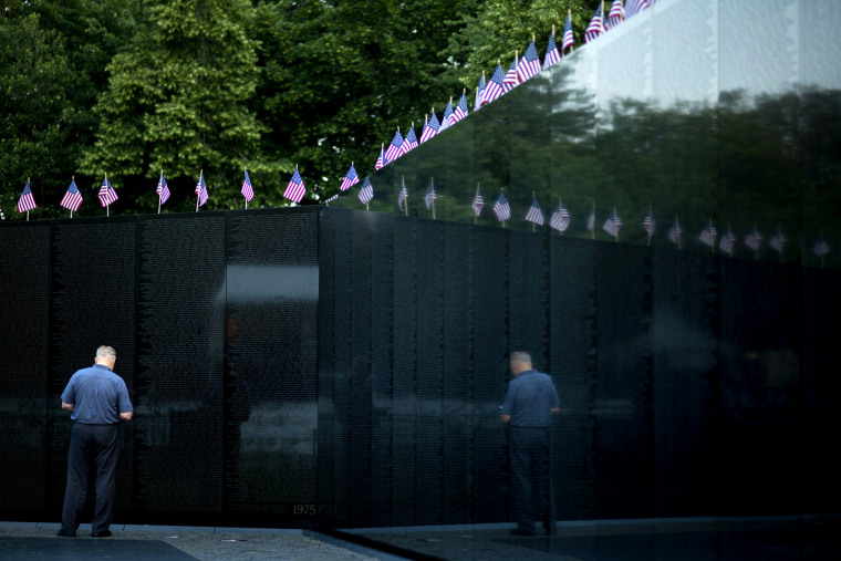A man visits the Vietnam Memorial Wall May 28, 2012 in Washington, DC. People around the United States celebrate Memorial Day to honor veterans and those members of the US military who have fallen in past and present wars. AFP PHOTO/Brendan SMIALOWSKIBRENDAN SMIALOWSKI/AFP/GettyImages