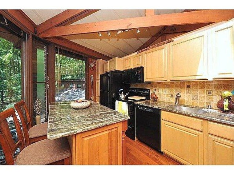 Built in 1978, much of the home has been updated. The kitchen features new granite countertops.