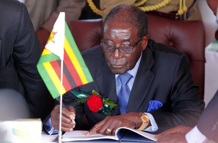 Zimbabwean President Robert Mugabe signs an agreement on Tuesday calling for the 2013 UNWTO General Assembly to be co-hosted by Zambia and Zimbabwe.