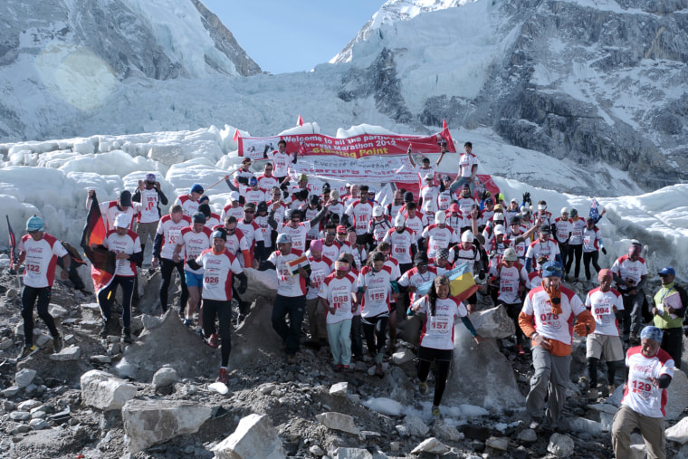 Handout photograph released by Himex, the organizers of the Tenzing-Hillary Everest Marathon, participants of the marathon are flagged off at Everest Base Camp in Nepal's Solukhumbu district on Tuesday, May 29.