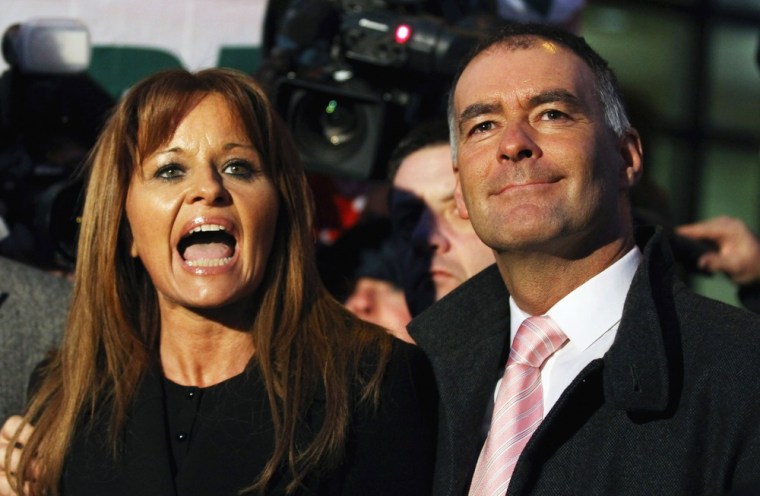 Tommy Sheridan and his wife Gail make a statement outside the High Court in Glasgow, Scotland, on Dec. 23 2010.
