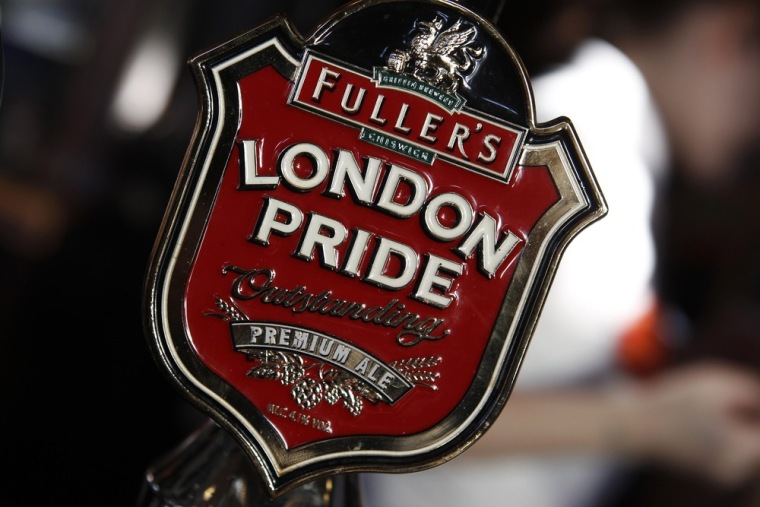 A brand of beer is seen on a pump at the Railway Tavern pub in east London Feb. 2, 2012. Built around 1825, the pub is across the road from the athlete's village. The landlady for the past 40 years Jan Dooner said: