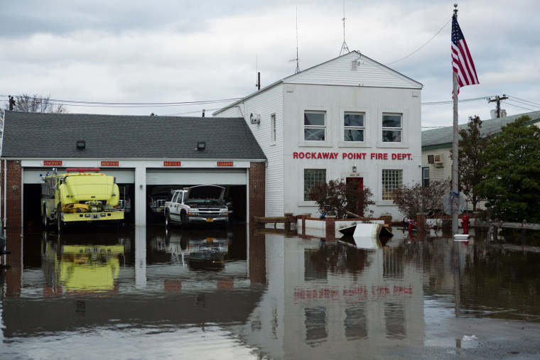The Rockaway Point Fire Department, one of three volunteer fire houses in Breezy Point, was unable to get its flooded trucks running during the storm.