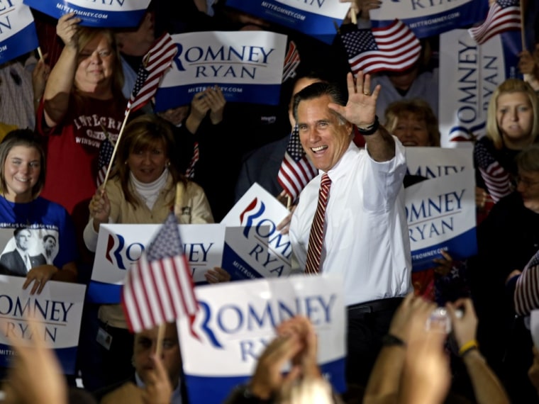 Republican presidential candidate Mitt Romney waves as he takes the stage for a campaign event at a window and door factory, Thursday, Nov. 1, 2012, in Roanoke, Va.