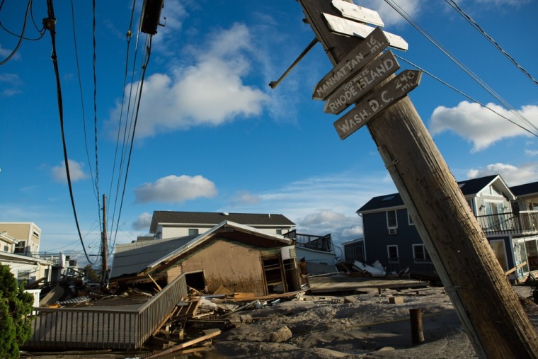 Breezy Point residents return to their devastated homes after Hurricane Sandy and a massive fire during the storm that destroyed over 100 tightly packed homes.