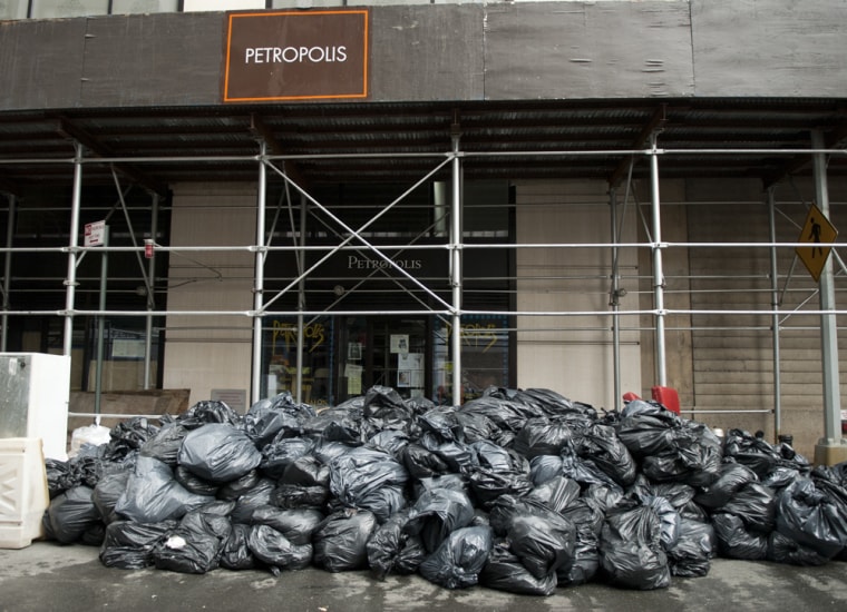 A large pile of garbage sits outside Petropolis in the Financial District of New York, N.Y. on  Nov. 1, 2012. Flooding and lack of electricity caused by Hurricane Sandy left parts of New York City in a mess.