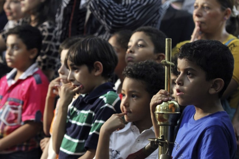 Young boys wait anxiously to hear which one of them will be selected to choose the new pope of Egypt's ancient Coptic Christian church, in Cairo on Nov. 3, 2012.