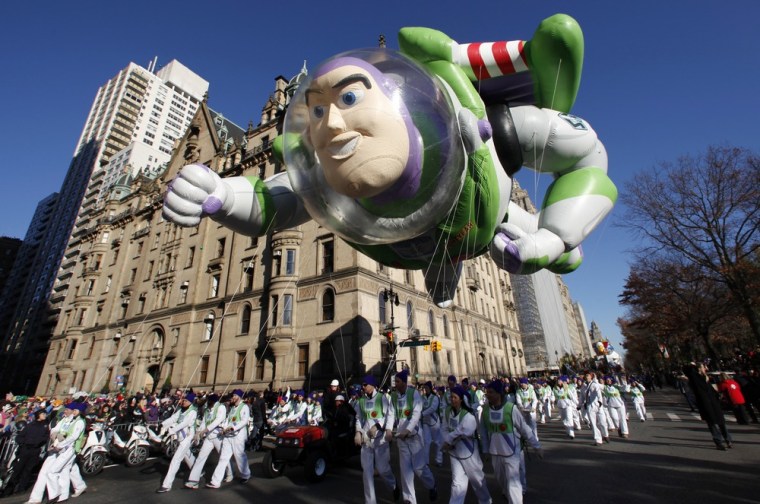 The Buzz Lightyear balloon floats down Central Park West during the 85th Macy's Thanksgiving day parade in New York City on November 24, 2011. Despite...