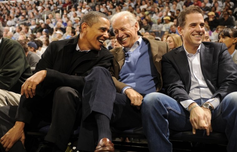 Hunter Biden, pictured with President Barack Obama and Vice President Joe Biden during a college basketball game in 2010, will be commissioned in the Navy Reserves.