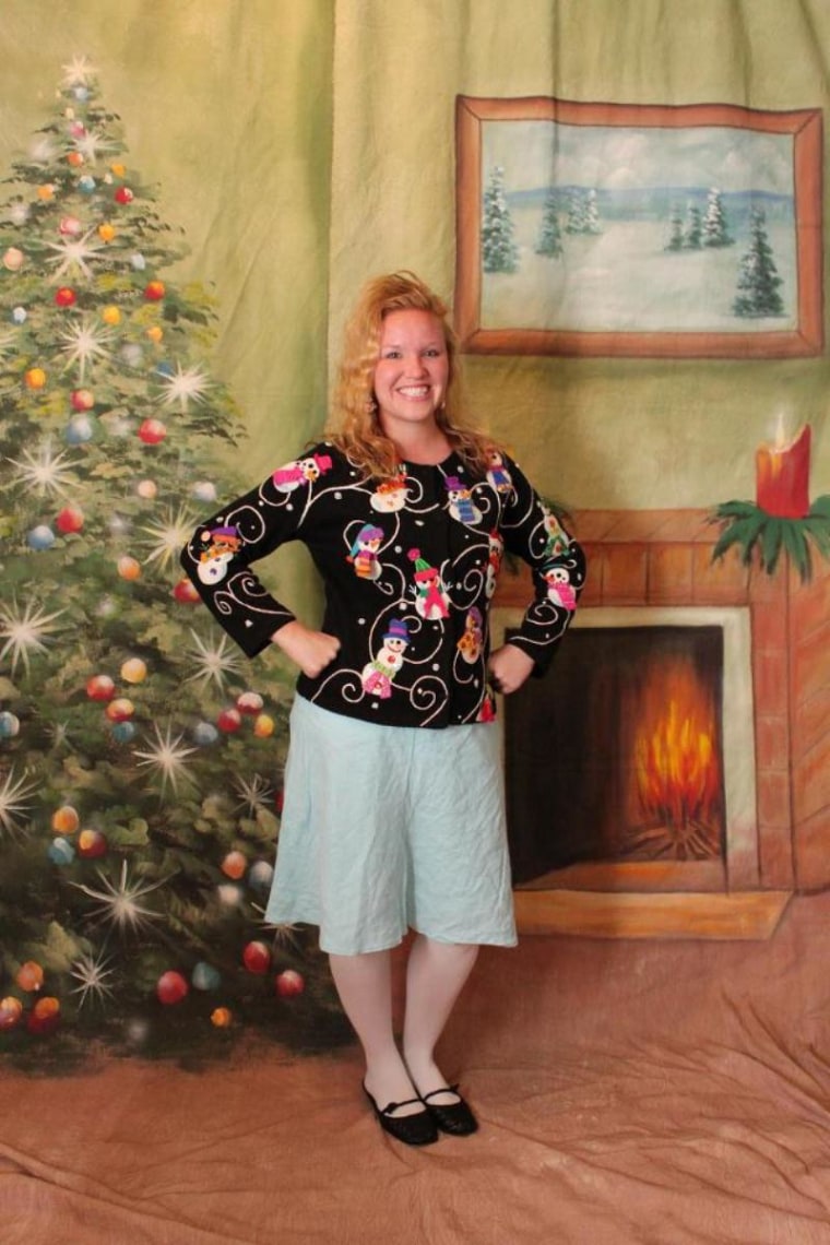 My brother had an ugly sweater party and had this great backdrop so that we could take pictures!!! I couldn't just sport the sweater, I had to go all out from head to toe!