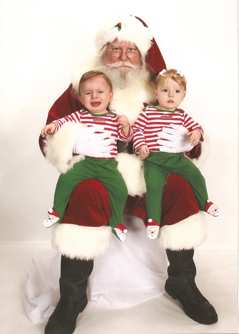 Trevor and Sloan, 11 months, aren't happy, but neither is Santa!