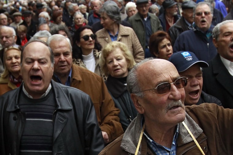 Pensioners demonstrate during an anti-austerity rally in Athens on Tuesday. Greece has admitted it still faces a tough job in persuading the European Union and IMF to save it from bankruptcy.