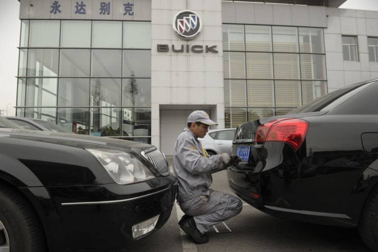 Sales in China helped GM retake the title of world's largest automaker from rival Toyota.