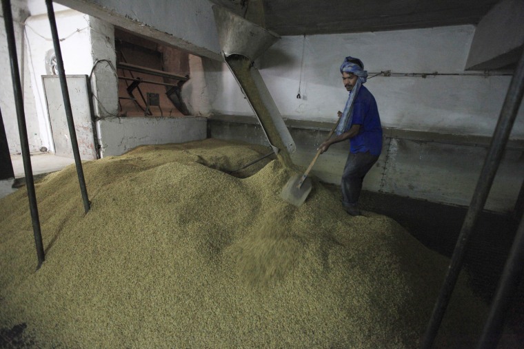 An employee prepares barley at the Murree Brewery in Rawalpindi, Pakistan, Nov. 10.