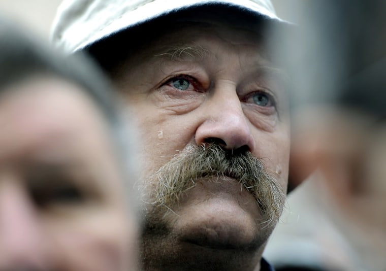 A man cries after the UN Yugoslav war crimes court acquitted former generals Ante Gotovina and Mladen Markac of charges including war crimes during the bloody breakup of Yugoslavia and ordered them free, in Zagreb on Nov. 16, 2012.