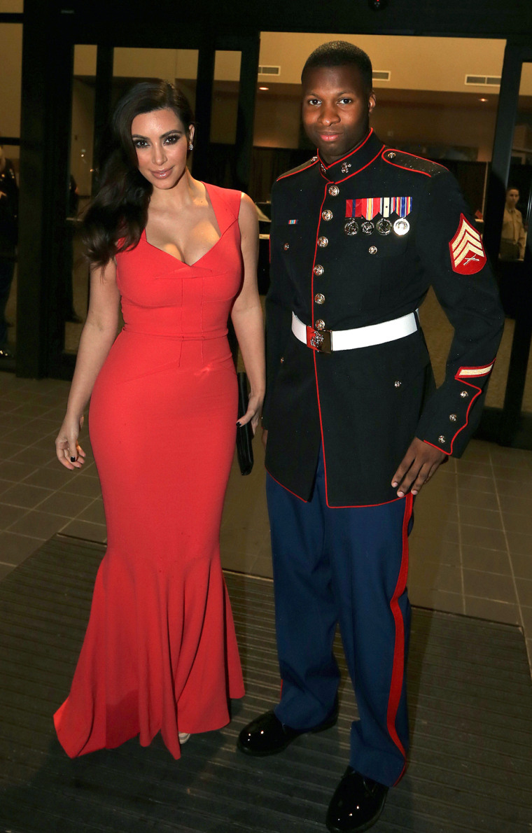 Kim Kardashian attends the Marine Corps Ball with Sgt Martin Gardner in Greenville, NC.
Sgt Gardiner could'nt keep his eyes off his A-list date as they posed for photographs. Kim, wearing a stunning Roland Mouret red dress arrived at the ball and stayed for dinner before leaving solo and headed back to her hotel.
Pictured: Kim Kardashian, Sgt Martin GardnerRef: SPL458343  151112  
Picture by: Aaron St. Clair / Splash News
Splash News and Pictures
Los Angeles:310-821-2666
New York:212-619-2666
London:870-934-2666
photodesk@splashnews.com
