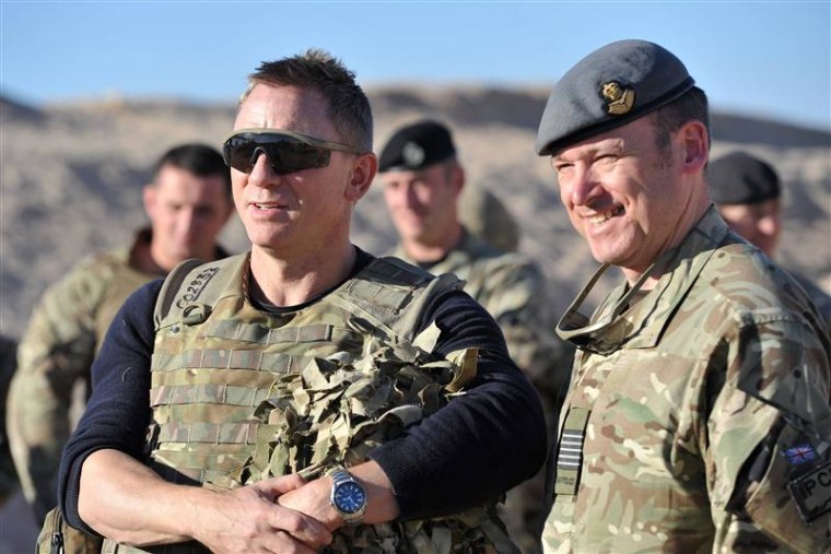 Actor Daniel Craig speaks to military personnel during a visit to Camp Bastion in Helmand Province, Afghanistan.