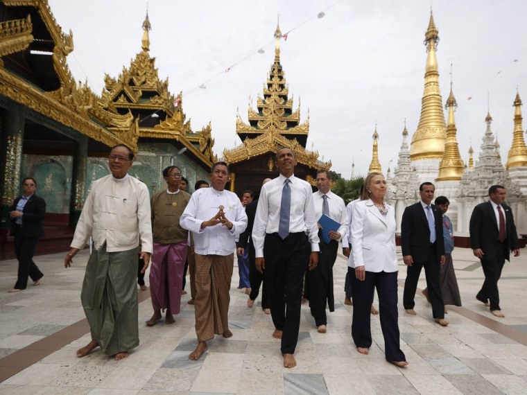 President Barack Obama and Secretary of State Hillary Clinton tour the Shwedagon Pagoda in Yangon Nov.19, 2012. Obama became the first serving U.S. president to visit Myanmar on Monday.